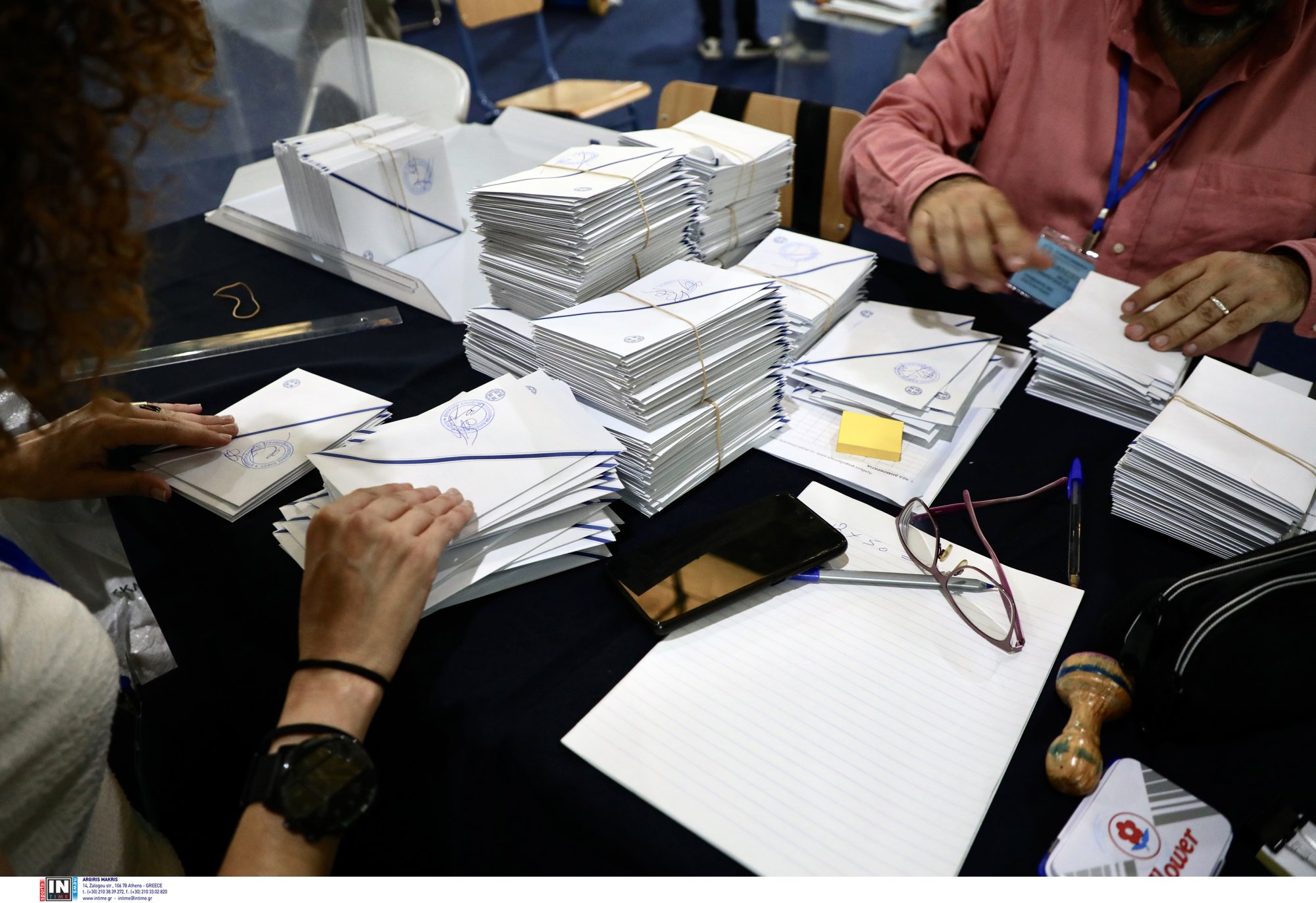 Electoral officials sorting mail in ballots from abroad