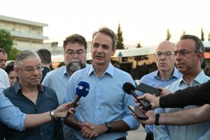 Greek PM Kyriakos Mitsotakis Visits Bus Depot, Reviews New Electric Buses
