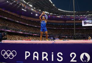 Day 15 – Karalis Greece’s Flag-Bearer at Closing Ceremony