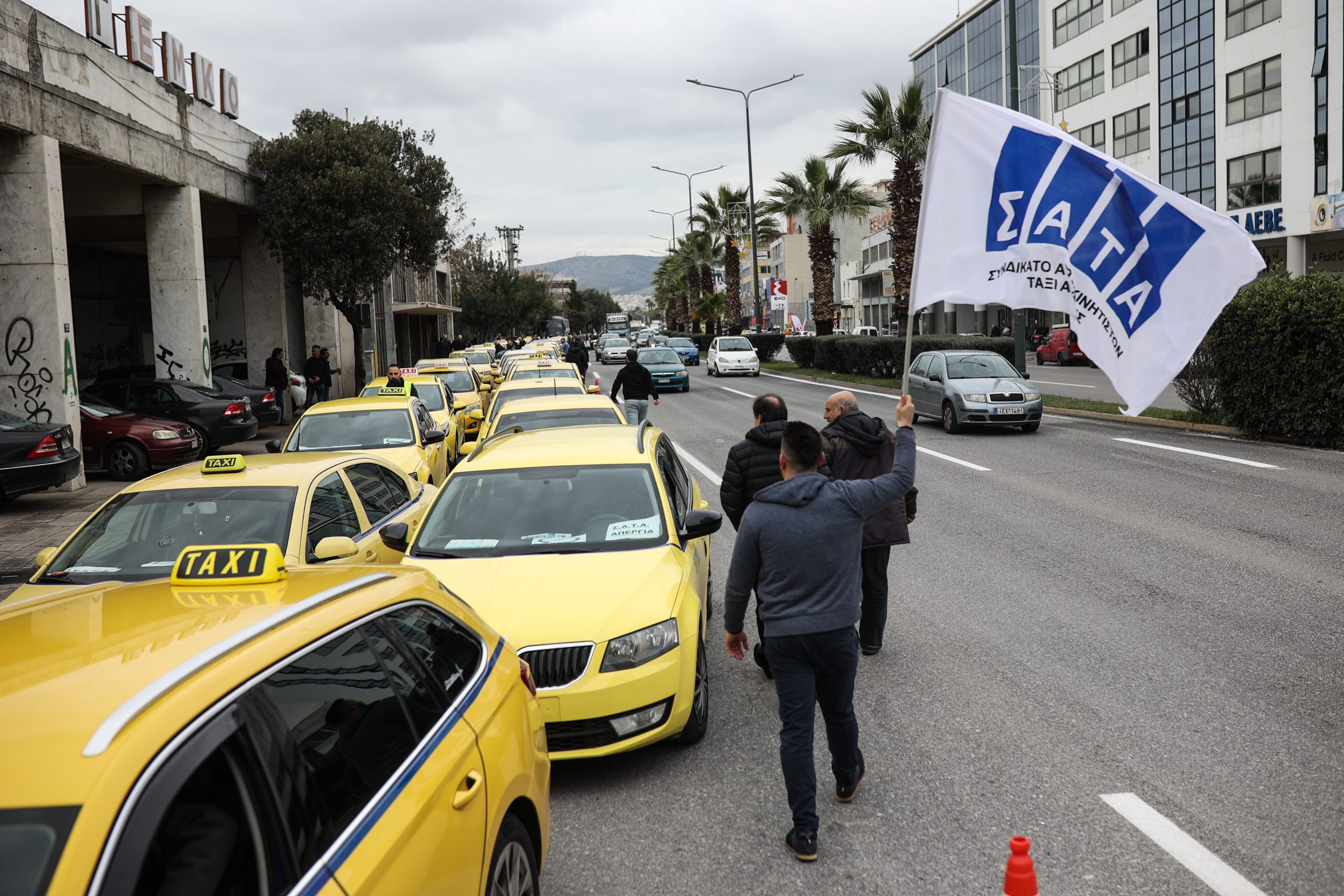 Taxi Drivers Battle Greece’s Ministry of Finance Over a Sticker