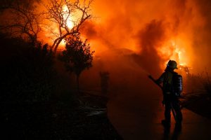 Two Dead, Many Injured as LA Fires Rage On